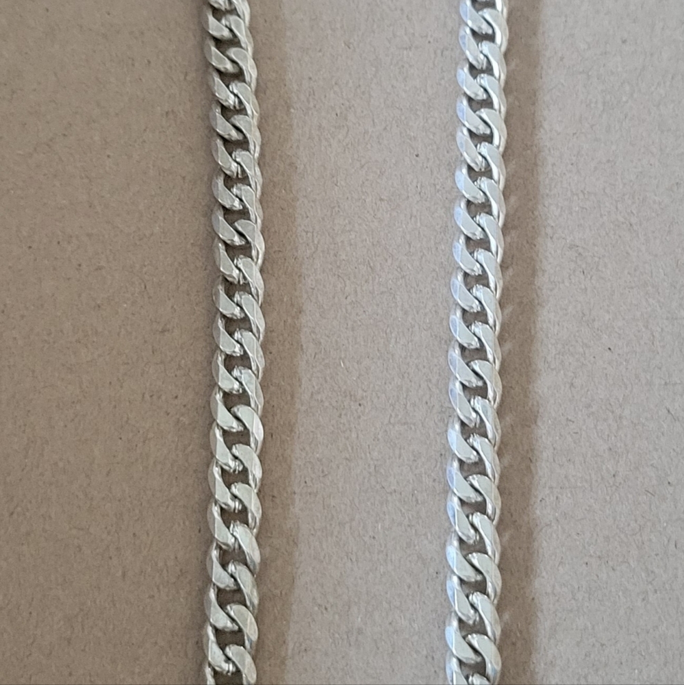 silver metal chain 12 inch drop with velvet gift bag, just professionally clean
